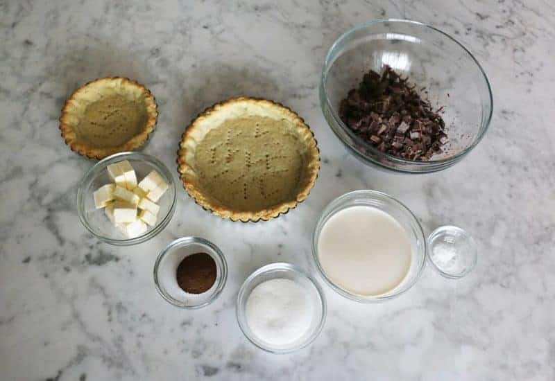 A photo of the ingredients to make a delicious chocolate tart.