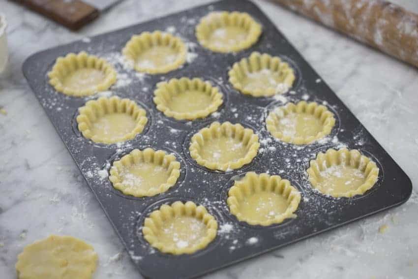 A photo of Tart shells ready to be baked.