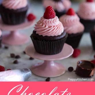 Pinterest graphic of chocolate raspberry cupcakes with two on mini cupcake stands.
