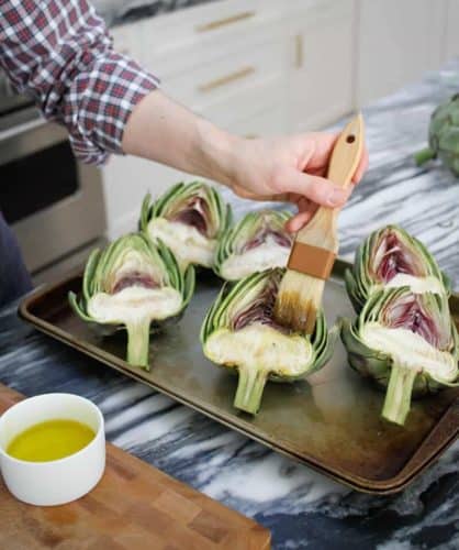 Cut artichoke brushed with oil.