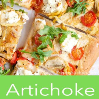 An overhead shot of artichoke pizza cut into slices