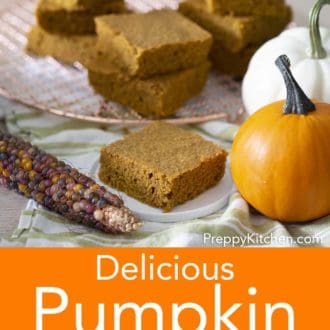 Stacked pieces of pumpkin cornbread on a wire cooling rack.