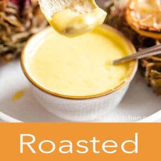 Pinterest graphic of a piece of roasted artichoke dipped in a bowl of sauce.