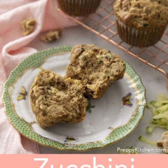Pinterest graphic of a zucchini muffin torn in half on a plate.