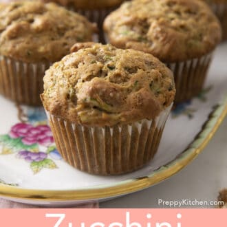 Pinterest graphic of zucchini muffins on tray.