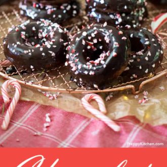 A clipping of chocolate peppermint donuts in a pile.