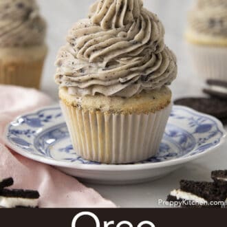 Pinterest graphic of an Oreo cupcake with Oreo frosting on a plate.