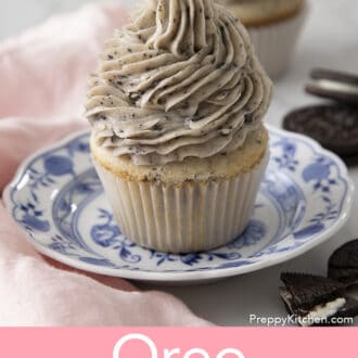 Pinterest graphic of an Oreo cupcake with Oreo frosting on a plate.