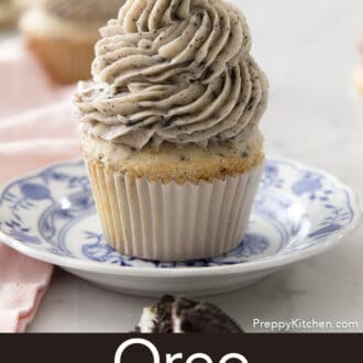 Pinterest graphic of a profile view of an Oreo cupcake with Oreo frosting on a plate.
