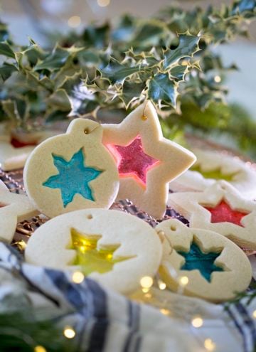 A photo of Stained glass cookies lit with small lights from behind