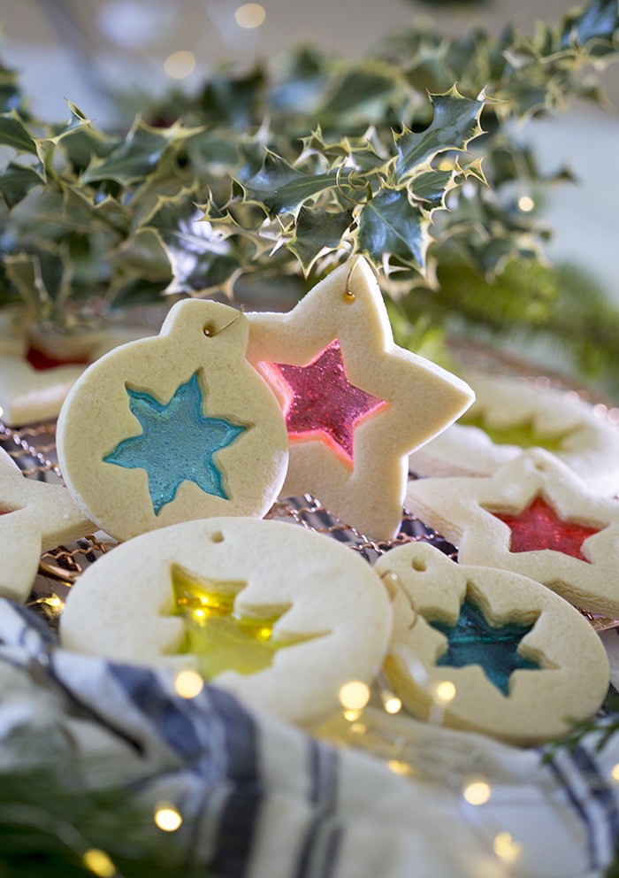 A photo of Stained glass cookies lit with small lights from behind