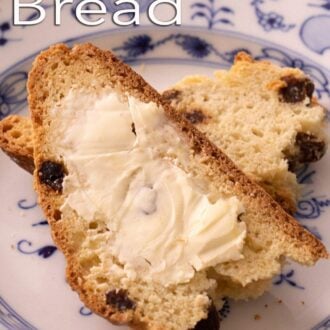 Pinterest graphic of a slice of Irish soda bread with butter on it.