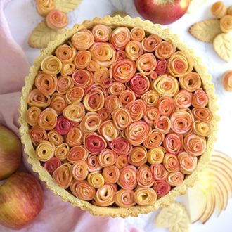 An apple rose pie. Peeled apples rolled up to look like roses and baked into a pie.
