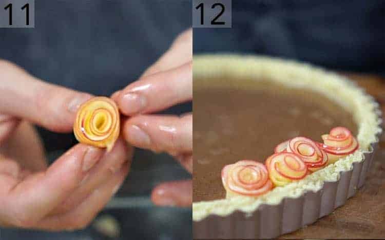 Apple roses being placed in a large tart shell.