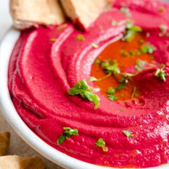 Close up view of beet hummus.