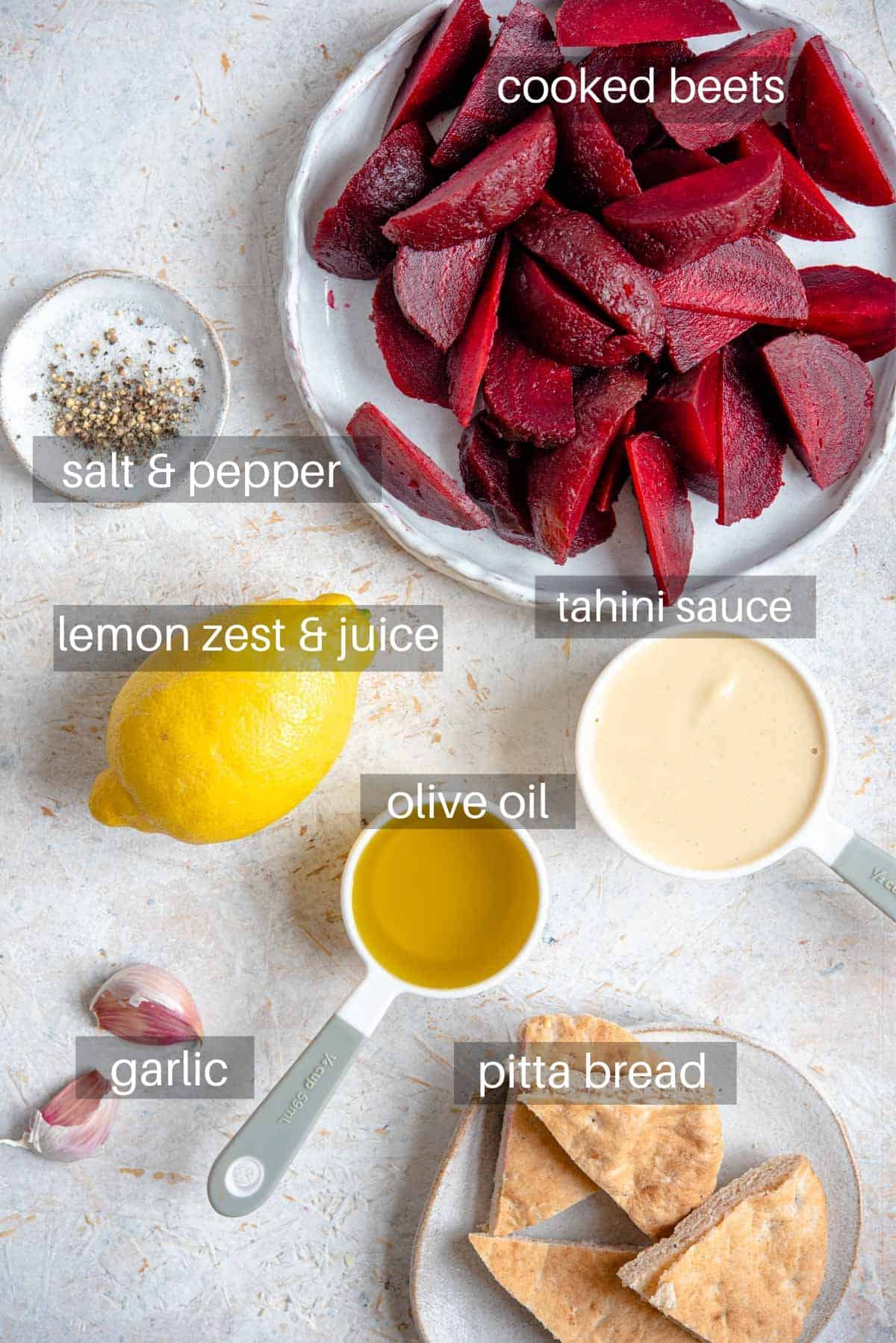 AN overhead shot of ingredients needed to make hummus with beets