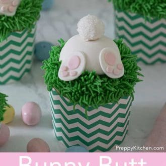 Pinterest graphic of three bunny butt Easter cupcakes with mini chocolate eggs scattered around.