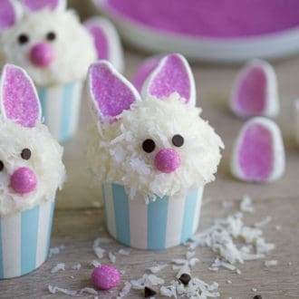Easter bunny cupcakes with marshmallow ears and coconut fur.