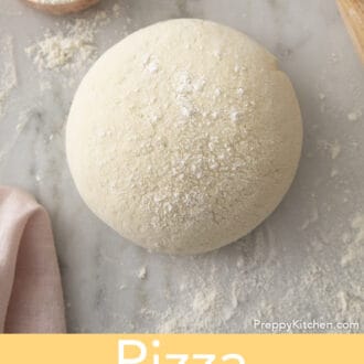 Pinterest graphic of a ball of pizza dough on a marble table.