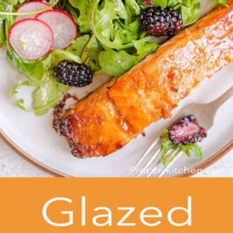An overhead shot of glazed salmon on a plate with glazed salmon written in text underneath