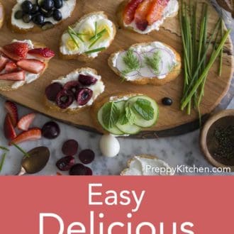 assorted canapes on a wooden serving tray