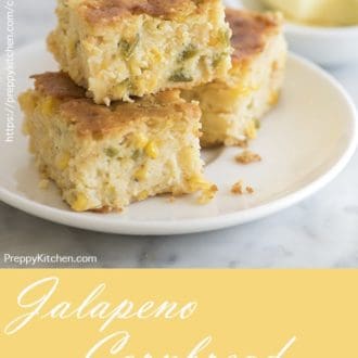 photo of jalapeño cornbread pudding squares on a white place
