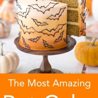 piece of three layered halloween cake with bat decor
