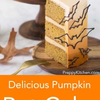 piece of three layered halloween cake with bat decor