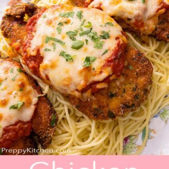 A pinterest graphic of chicken parmesan on top of spaghetti.