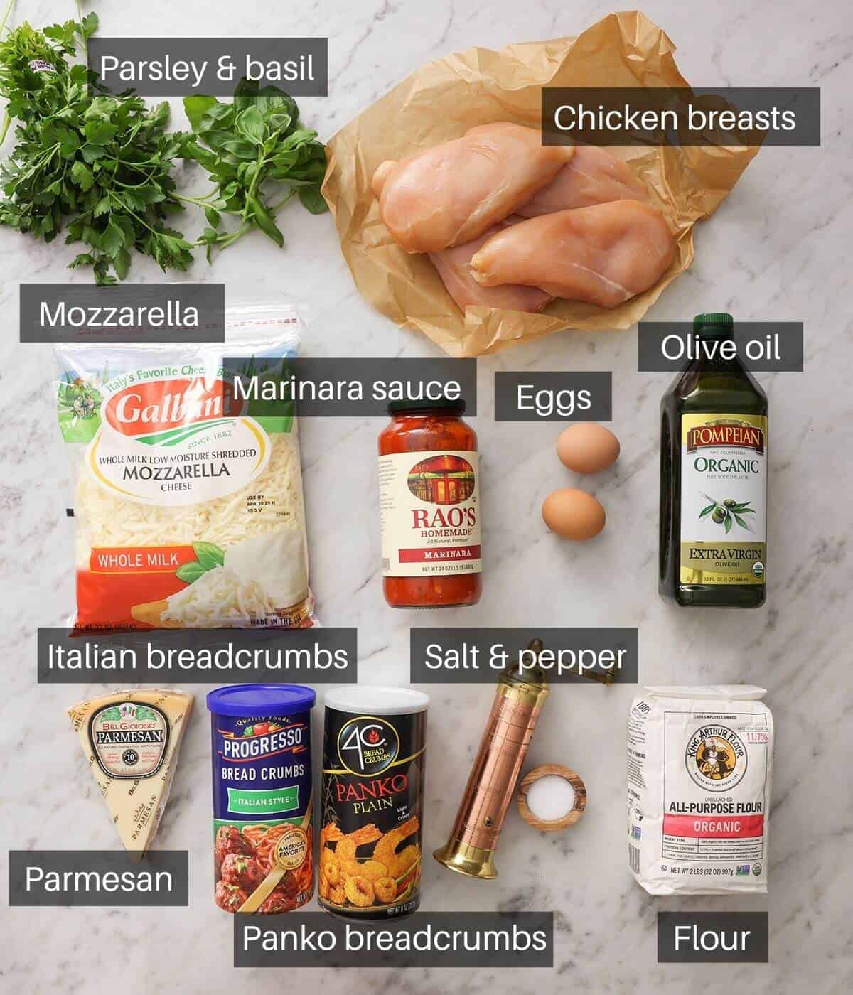 An overhead shot of all the ingredients you need make chicken parmesan.