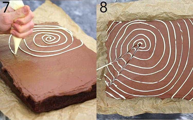 A spiderweb pattern being piped on with white buttercream.