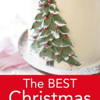 three layer christmas cake with hand painted buttercream christmas tree decoration