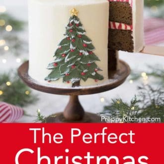 three layer christmas cake with hand painted christmas tree decoration