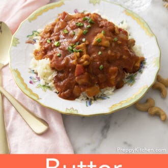 Butter chicken on a porcelain plate.
