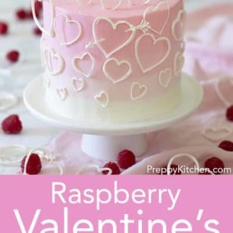 valentines day cake with white hearts on a stand