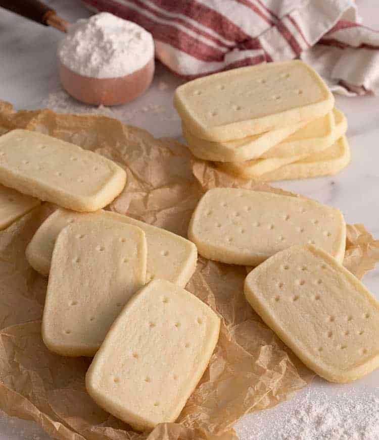 Rectangular shortbread cookies on a marble table.