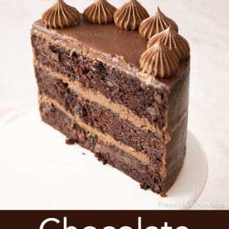 half of a chocolate zucchini cake on a cake stand