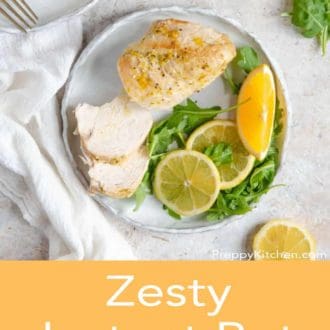 Pinterest graphic of and Instant Pot chicken breast on a plate with orange slices and a wedge with some greens. More oranges and greens on the side.