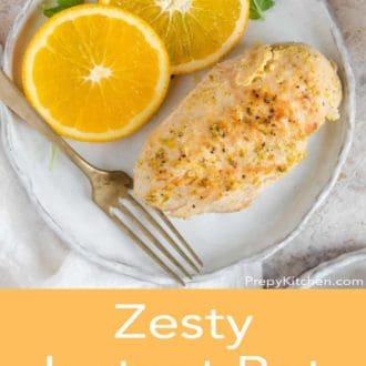 Pinterest graphic of a plate with an Instant Pot chicken breast with two orange slices and a fork.
