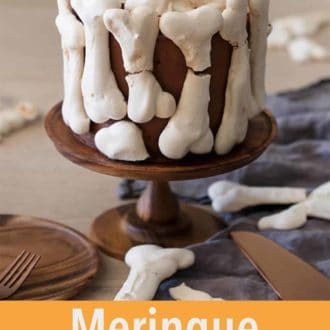 Pinterest graphic of a meringue bones cake.