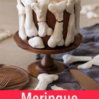 Pinterest graphic of a meringue bones cake.