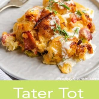 tater tot casserole on a white plate with a fork