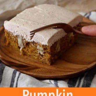 Pinterest graphic of a fork scooping down onto a slice of pumpkin poke cake.