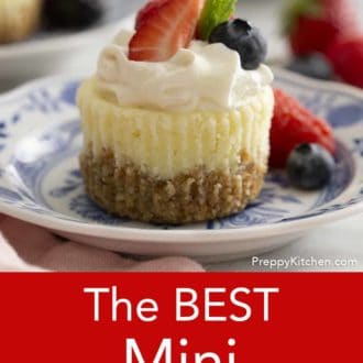 Pinterest graphic of a mini cheesecake on a plate with whipped cream and berries.