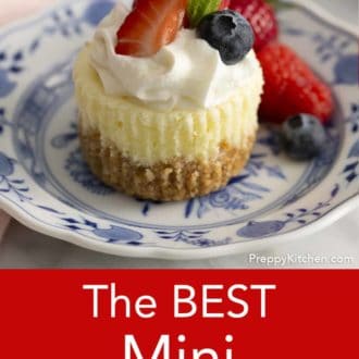 Pinterest graphic of a mini cheesecake on a plate with berries.
