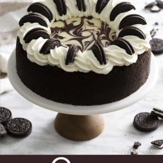 Pinterest graphic of an Oreo cheesecake on a cake stand.