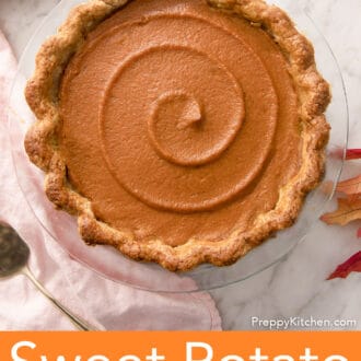 Pinterest graphic of an overhead view of a baked sweet potato pie with decorative leaves scattered around.