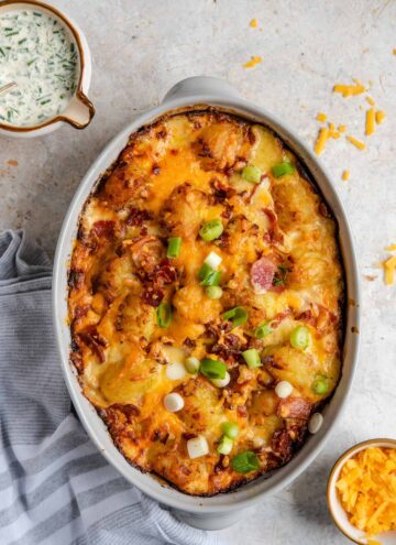 Overhead view of a tater tot casserole topped with green onions.