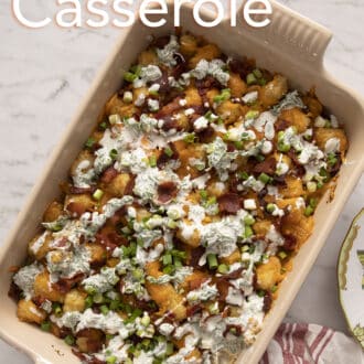 A rectangular baking dish filled with tater tot casserole.