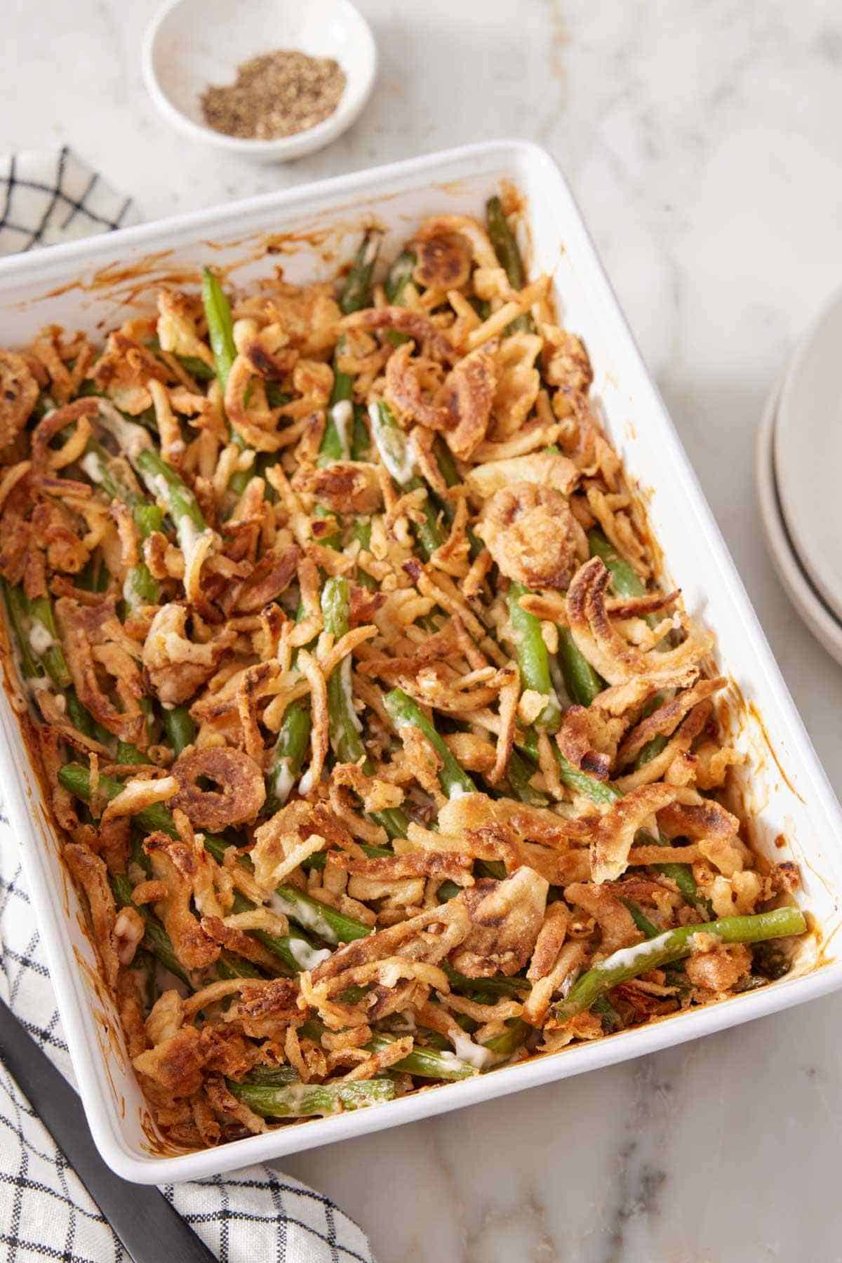 Green bean casserole in a white baking dish.